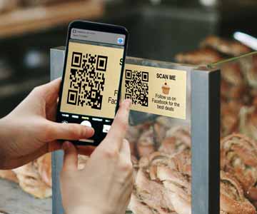 Aluminum QR code sign posted at cashier near the breads.
