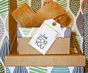 A wrapped present with a tag reading “Just For You.”