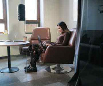 Smiling woman typing on her laptop