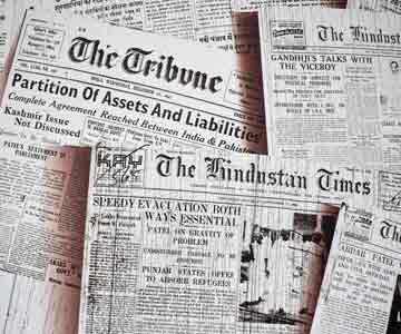 Collection of newspaper piled on top of each other