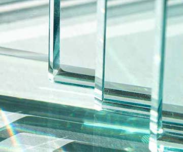 Clear Jade Glass Stacked Vertically On Top Of Another Piece Of Jade Glass