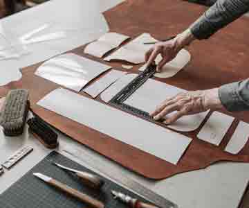 Crafting with a T-square for clean, measured lines.