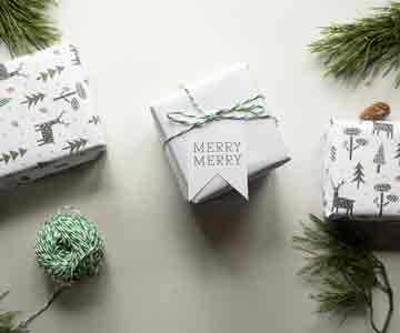 Small gift ornament decor with a "Merry Christmas" note attached.