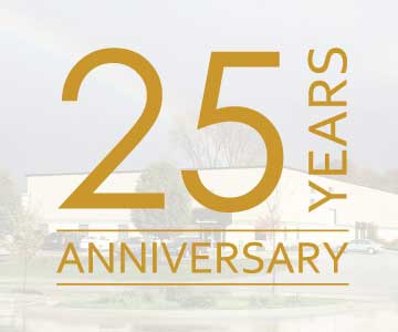 PlaqueMaker's 25 Years Anniversary Over Picture Of Building