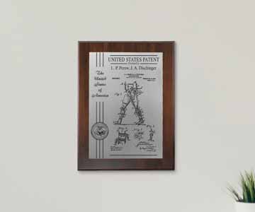 Custom patent plaque hanging on the wall. 