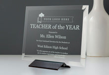 Custom Glass Award Plaque On Black Stand On Desk Near Vase