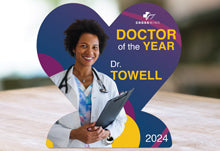 Custom Printed Stainless Steel Heart Award On Table.