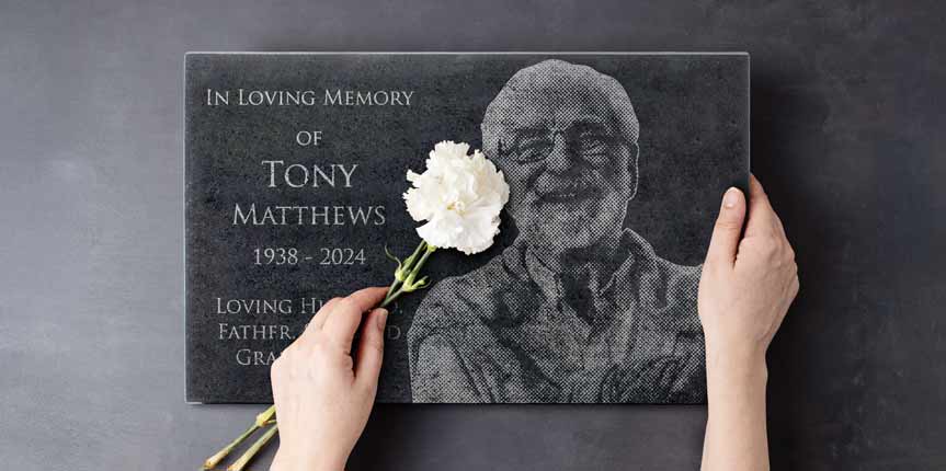 Custom Engraved Granite Headstone With Picture Held By Woman With White Rose