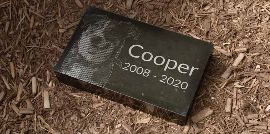 Custom Granite Headstone For Cooper Engraved With Image of the Dog Cooper In Mulch