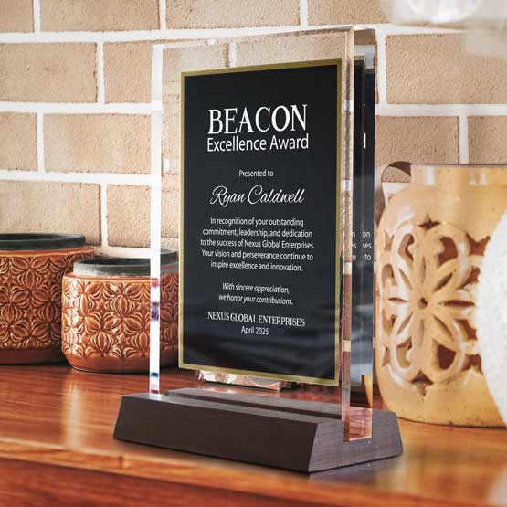 Custom Standing Black And Gold Acrylic Award For Excellence With Name And Wooden Base On Wood Shelf With Vases