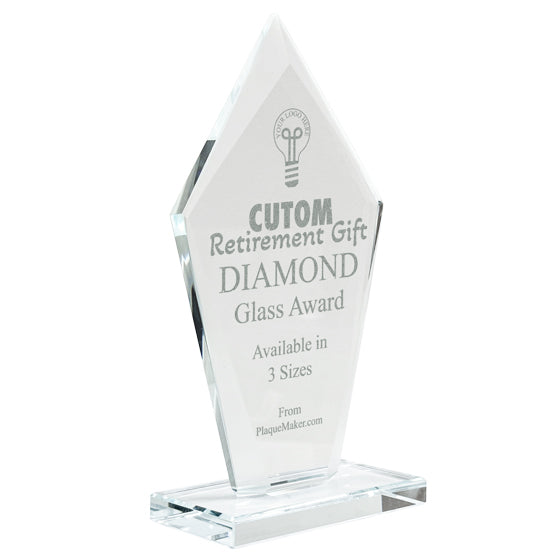 A clear glass award in the shape of a tall diamond with custom engraved text and placeholder art, set at a slight angle on a white background.