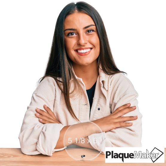 Size Guide With Happy Woman Sitting Behind Custom Circle Glass Award With Silver Pin At A Wood Desk