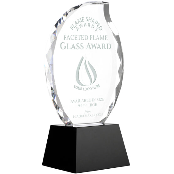 A faceted clear glass trophy award with a black pyramid base, featuring custom engraving with a placeholder artwork, set on a white background at a slight angle.