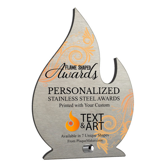 A flame-shaped personalized stainless steel award on a plain white background. The award features printed on orange swirl pattern, custom black text, and a small silver mounting pin at the bottom center.