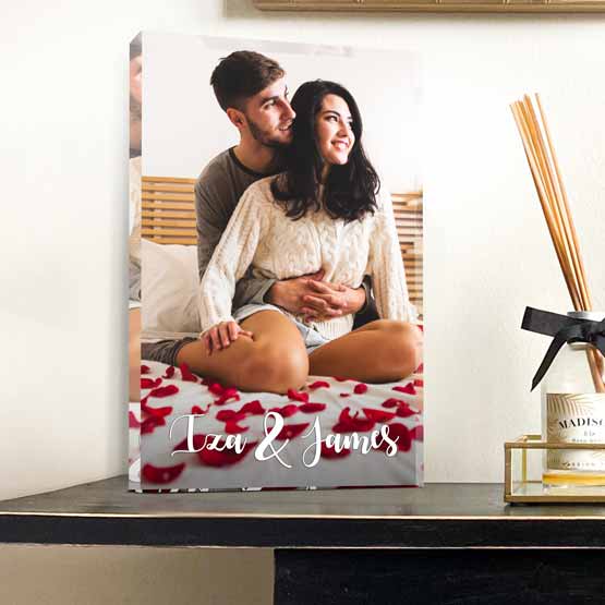 Custom Rectangle Clear Acrylic Keepsake With Full Color Photo Of Couple Cuddling In Bed On A Shelf With Decor