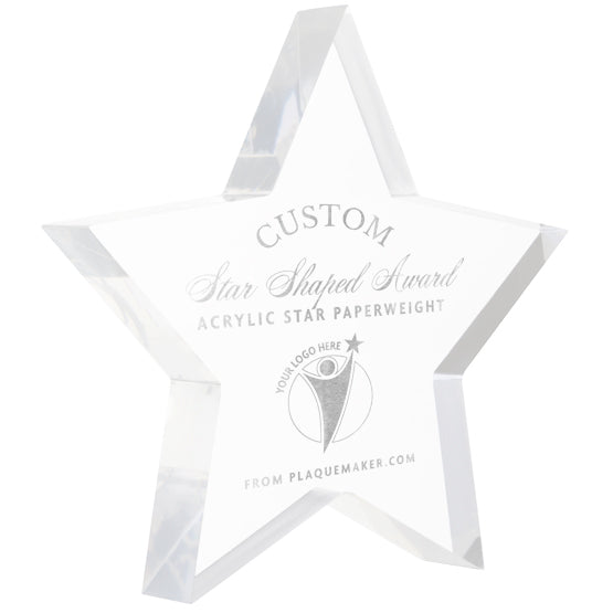 A clear acrylic star-shaped award with custom engraved text, shown on a plain white background.
