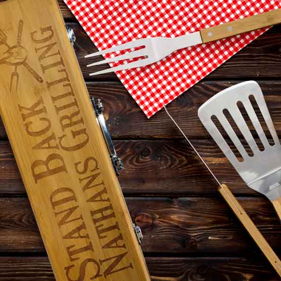 Custom Rectangle Bamboo Grill Set Case With Grilling Message And Artwork On Wood Table With Picnic Napkin And Grilling Tools