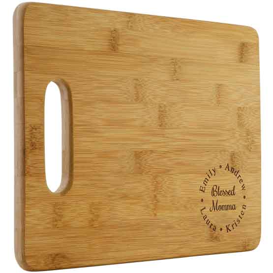 Custom Bamboo Cutting Board With Rectangle Shape And Blessed Mama Text And Family Names Against A White Background