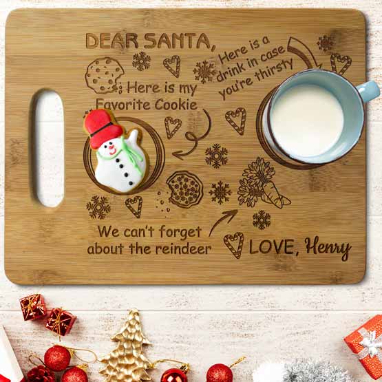 Custom Bamboo Cutting Board With Festive Artwork And Dear Santa Message With Glass Of Milk And Snowman Cookie On Table