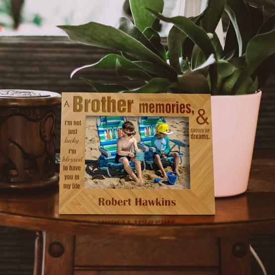 Custom Bamboo Picture Frame With Brother Appreciation Message And Photo Of Two Kids At Beach On A Stand With Potted Plant