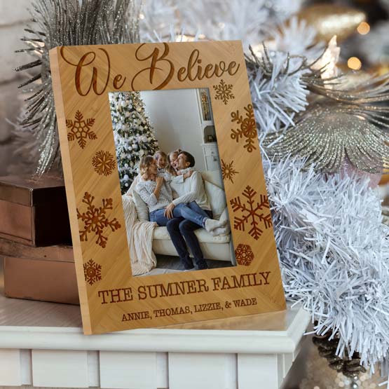 Custom Bamboo Picture Frame With Family Photo On Couch And Engraved With Names And Snowflakes On Mantle With Festive Decor