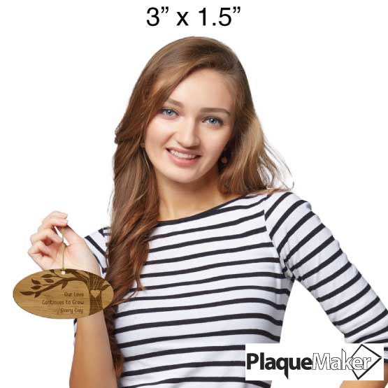 Size Guide With Happy Woman Holding Oval Bamboo Ornament Engraved With Tree Artwork And Romantic Message Via Gold String