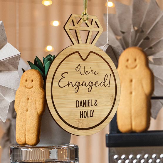 Custom Engagement Ring Shaped Bamboo Ornament Hanging Via Gold String Nearby Wedding Decor And Cookies