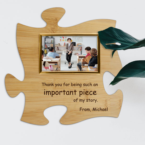 Custom Puzzle Piece Bamboo Sign With Gold Picture Frame And Teacher Photo And Teacher Appreciation Message Hanging On Wall