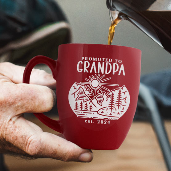 Man Hand Pouring Coffee Into Custom Red Ceramic Bistro Mug Engraved With Nature Artwork And Promoted To Grandpa Text