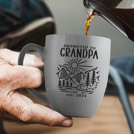 Man Hand Pouring Coffee Into Silver Ceramic Bistro Mug Engraved With Nature Art And Promoted To Grandpa Text