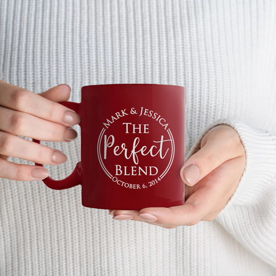 Woman Hands Holding Custom Red Coffee Mug Engraved With Couple Names And The Perfect Blend Text And Date