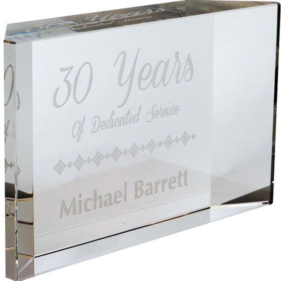 Custom Faceted Glass Paperweight With Freestanding Design And Engraved With Name And Years Of Service Text