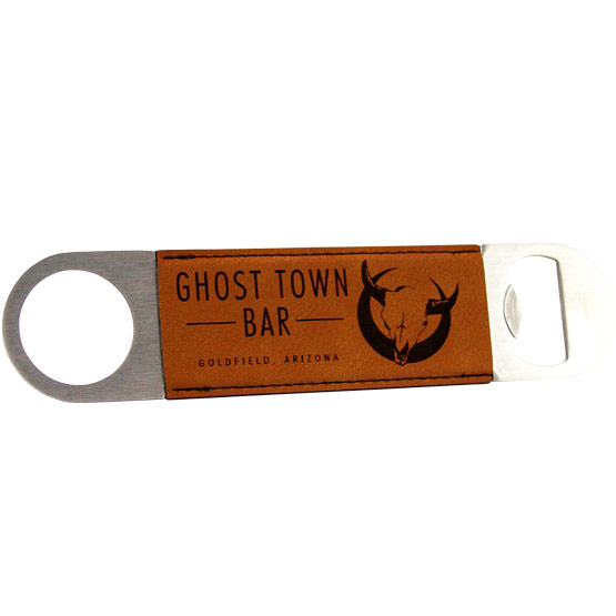 Stainless Steel And Rawhide Faux Leather Bottle Opener Laser Engraved With Ghost Town Bar Logo Against A White Background