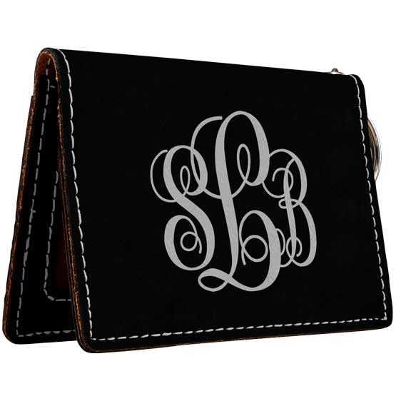Custom Black And Silver Faux Leather Keychain Wallet ID Holder Laser Engraved With Ornate Initials Against A White Background