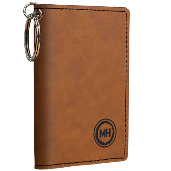 Custom Rawhide Faux Leather Keychain Wallet ID Holder Laser Engraved With Initials Against A White Background
