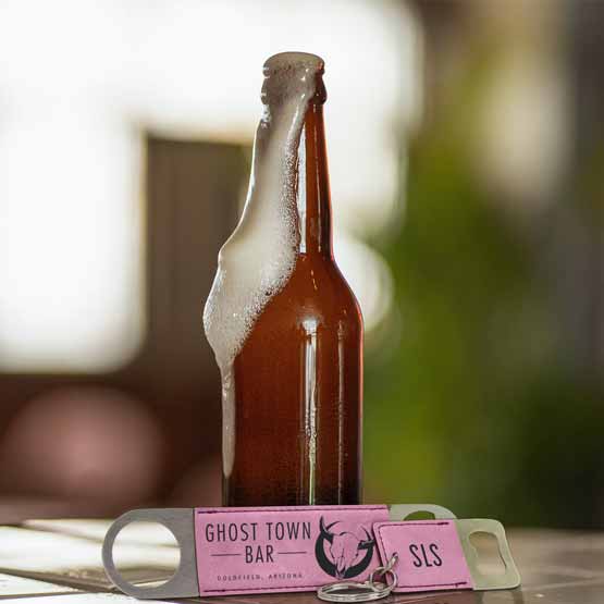Set Of Custom Pink Faux Leather Bottle Opener Engraved With Ghost Town Bar And A Small Keychain Bottle Opener Near Beer