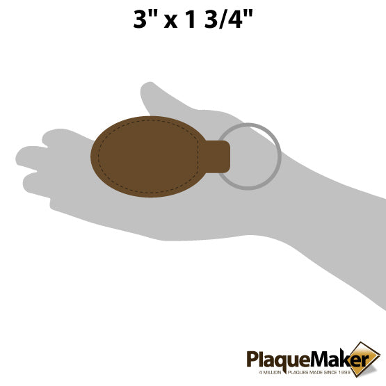 Size Guide With Blank Hand Holding Custom Dark Brown Faux Leather Oval Keychain Against A White Background
