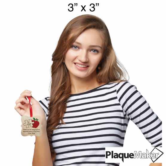 Size Guide With Woman Holding Ornate Maple Wood Ornament With Print Of Puzzle Piece And Apple And Teacher Thank You Message