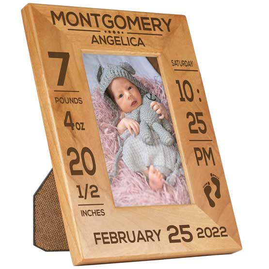 Custom Red Alder Picture Frame With Baby Photo And Laser Engraved With Newborn Details Against A White Background