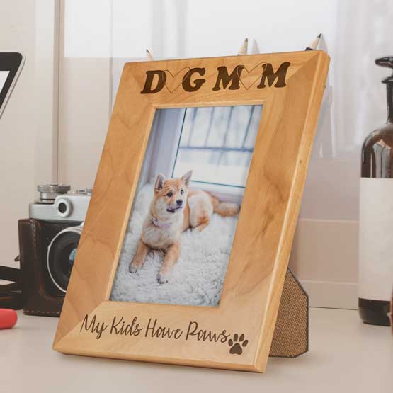 Red Alder Picture Frame With Dog Photo And Engraved With Dog Mom And My Kids Have Paws And Paw Print On Shelf With Old Camera