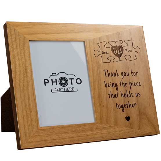 Red Alder Picture Frame Engraved With Dad Inside Puzzle Pieces Art And Thank You Message Against A White Background