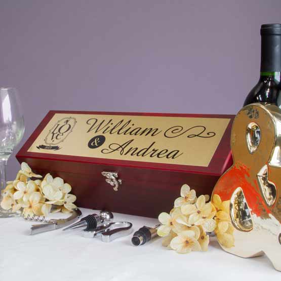 Rosewood Wine Box With Metal Plate Featuring Couple Names And Love Artwork On White Table With Wine Tools And Flowers
