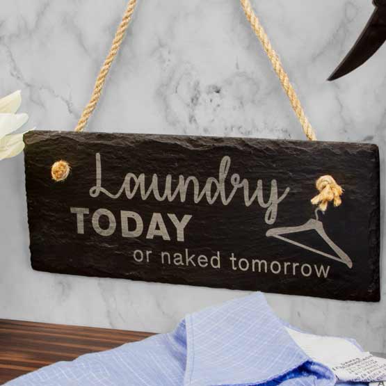 Slate Rectangle Sign Printed With Laundry Today Or Naked Tomorrow And Hanger Art Hanging On Wall Above Laundry Shelf Via Rope
