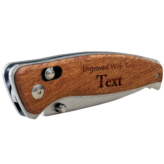 Wood And Stainless Steel Folding Knife With Button Lock In A Closed Position And Laser Engraved To Show Customizable Areas