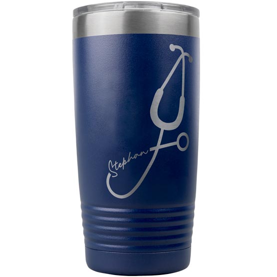 Navy Blue 20 Ounce Stainless Steel Tumbler Laser Engraved With Custom Name Inside Stethoscope Art Against White Background