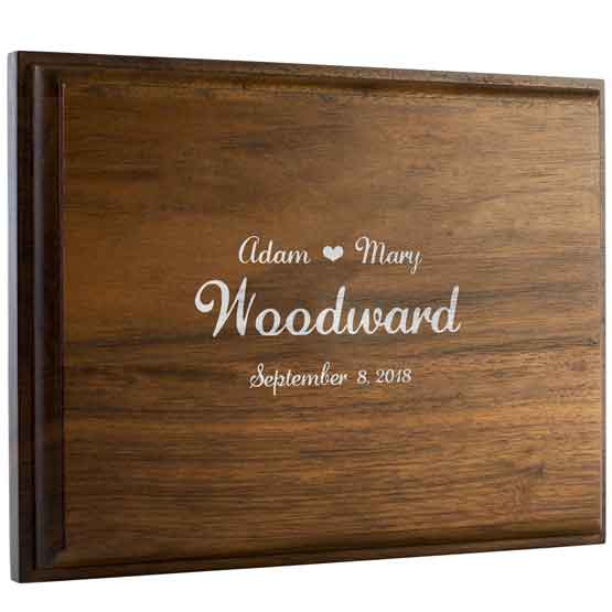 Custom Walnut Guest Book Plaque Laser Engraved With Married Couple Names And Date Against A White Background