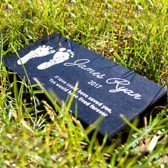 Custom Engraved Granite Headstone For Baby On Grass.