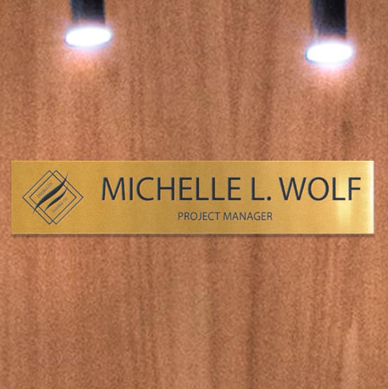 Custom Engraved Brass Name Plate With Logo On Wall Near Office.