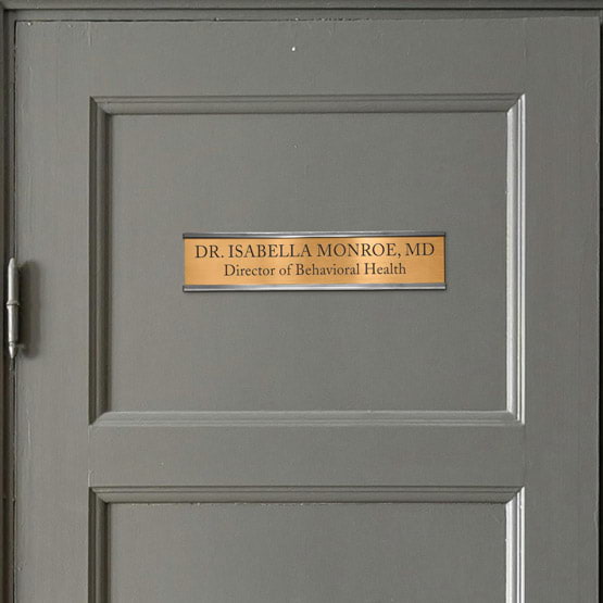Bronze Office Name Plate Laser Fused With Doctor Name And Details Mounted Onto Office Door Via Silver Bracket