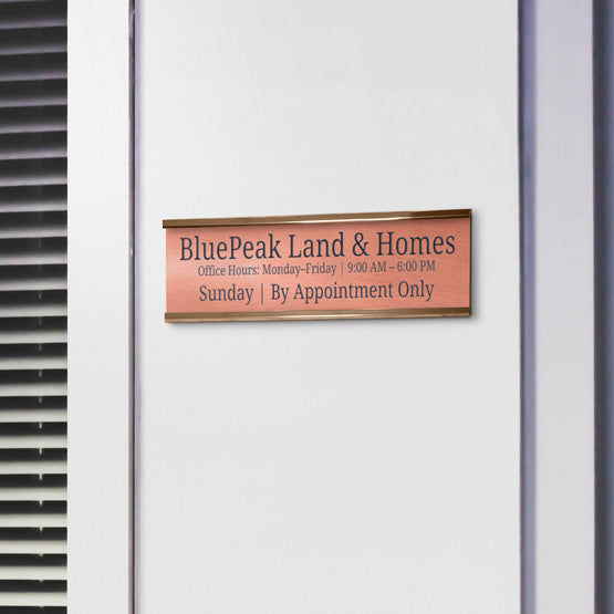 Copper Office Name Plate Laser Fused With Custom Property Name And Office Hours Mounted On Wall Via Gold Bracket